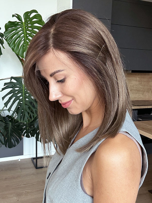 A luxury wig styled with a hairpin